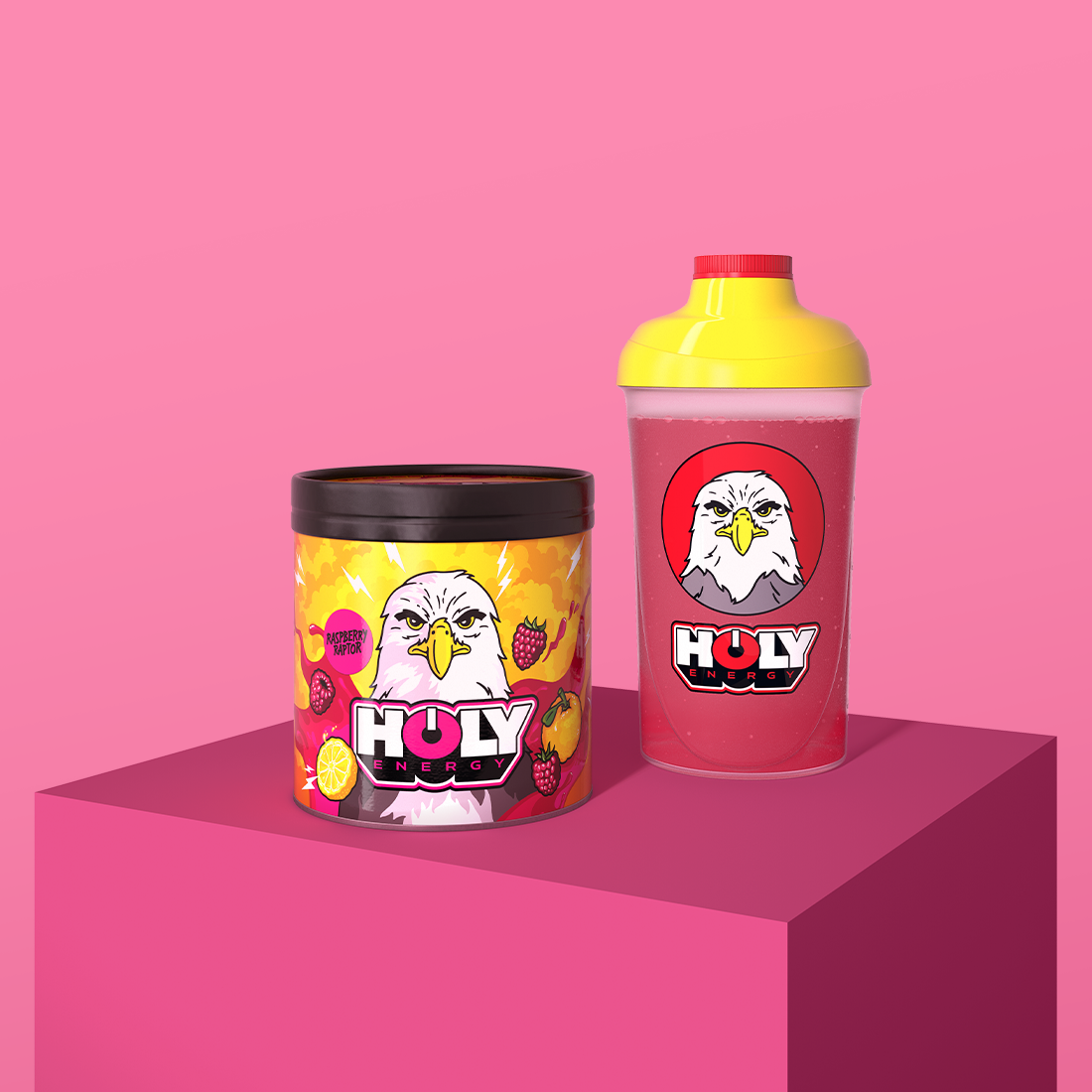 Eine bunte Pappdose und ein Shaker mit einem Adler-Logo vor einem pinken Hintergrund.