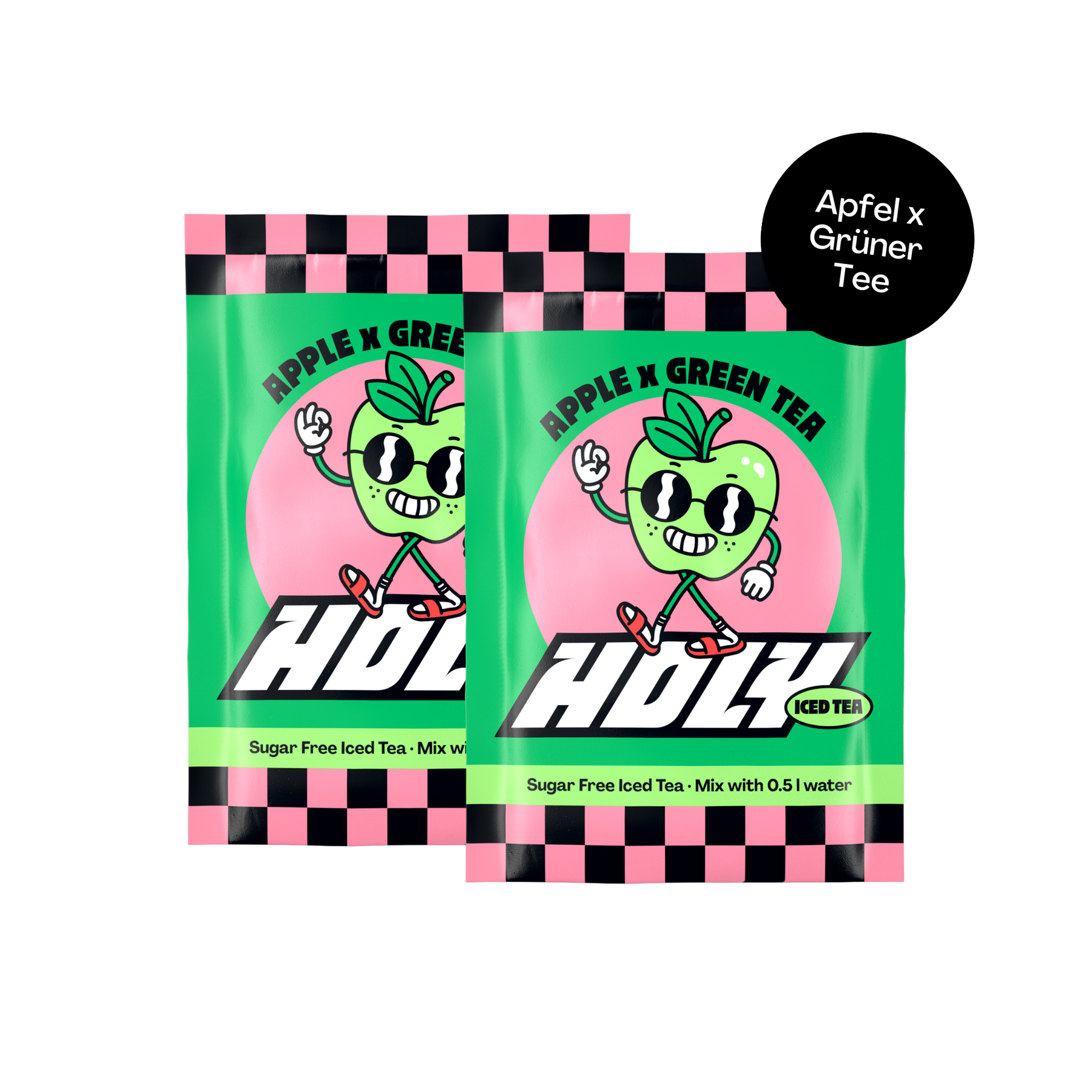 Zwei grüne Probepackungen Apfel x Grüner Tee mit einem Cartoon-Apfel und schwarz-pinkem Schachbrettmuster oben.