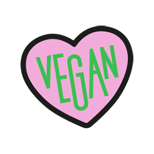 Rosa Herz mit grünem Text "Vegan" darauf, auf schwarzem Hintergrund.