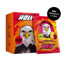 Orange Pappbox und Probepackung mit Adler-Design und Himbeere-Yuzu-Geschmack, beschriftet mit "Raspberry Raptor".